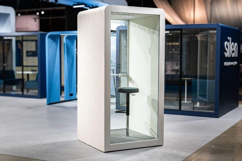 A pod interior with its integrated stool and upholstered seating